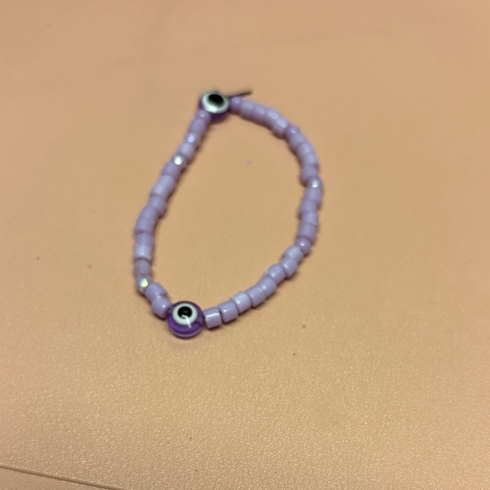 Purple Beaded Bracelet with Evil Eye Charm
